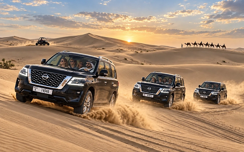 Travelers enjoying a Dubai desert safari with 4x4 dune driving