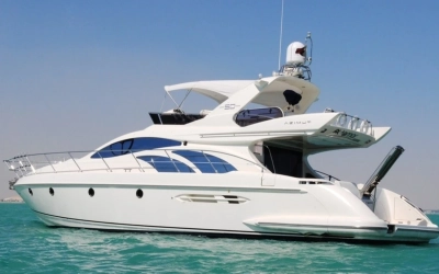 Private luxury yacht cruising through Dubai Marina