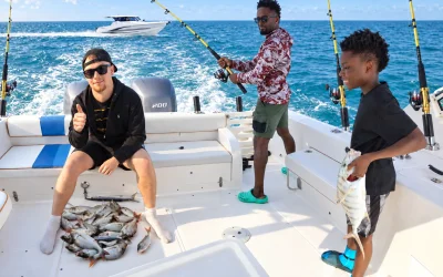 Travelers enjoying a deep sea fishing tour on a boat in Dubai
